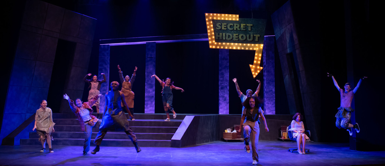 Production photograph for Urinetown at University of Missouri; scenic design by Brandon PT Davis.